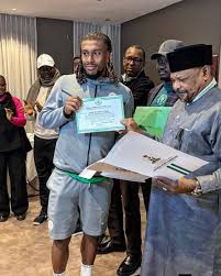 2023 AFCON: FG Presents National Honours, Housing Documents to Super Eagles